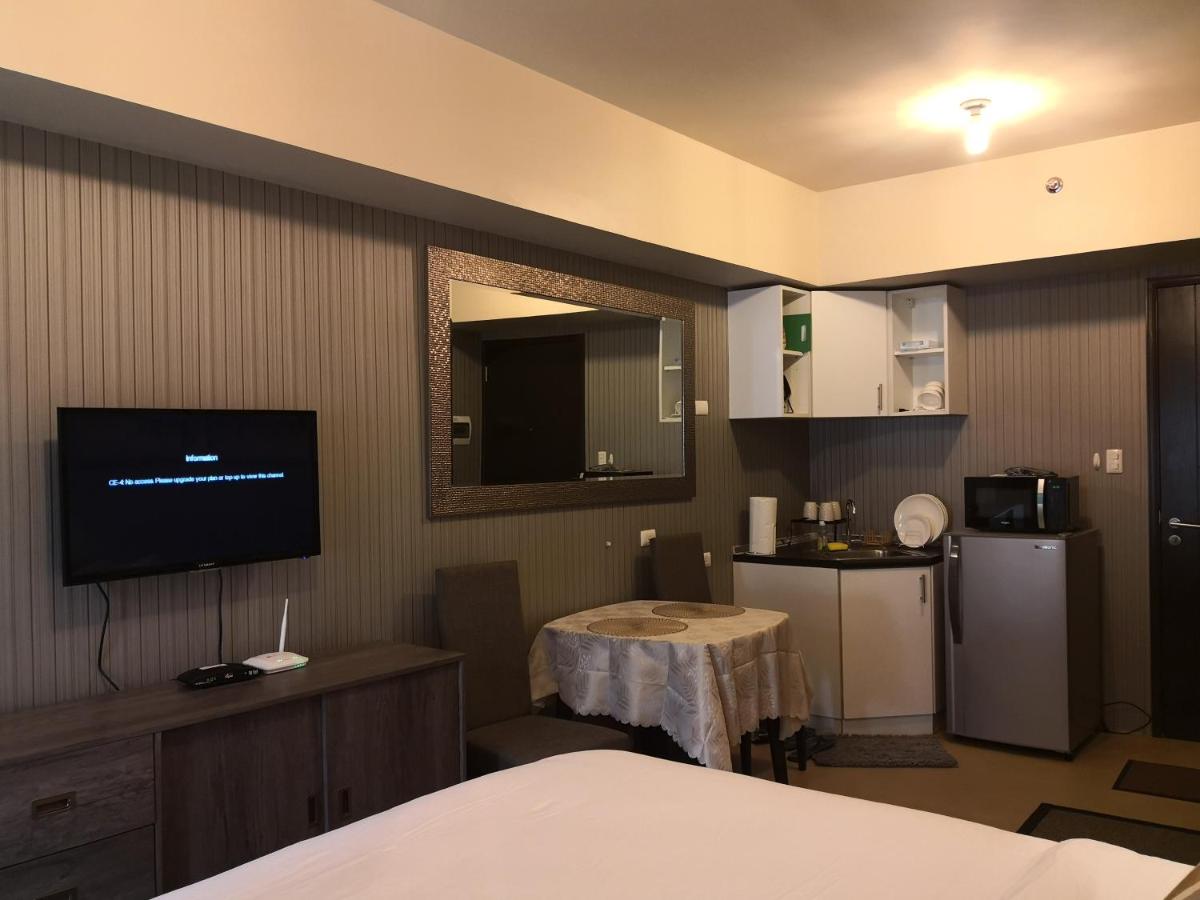 Centrio Tower Beside Ayala Studio Unit with Balcony 23 - Housity