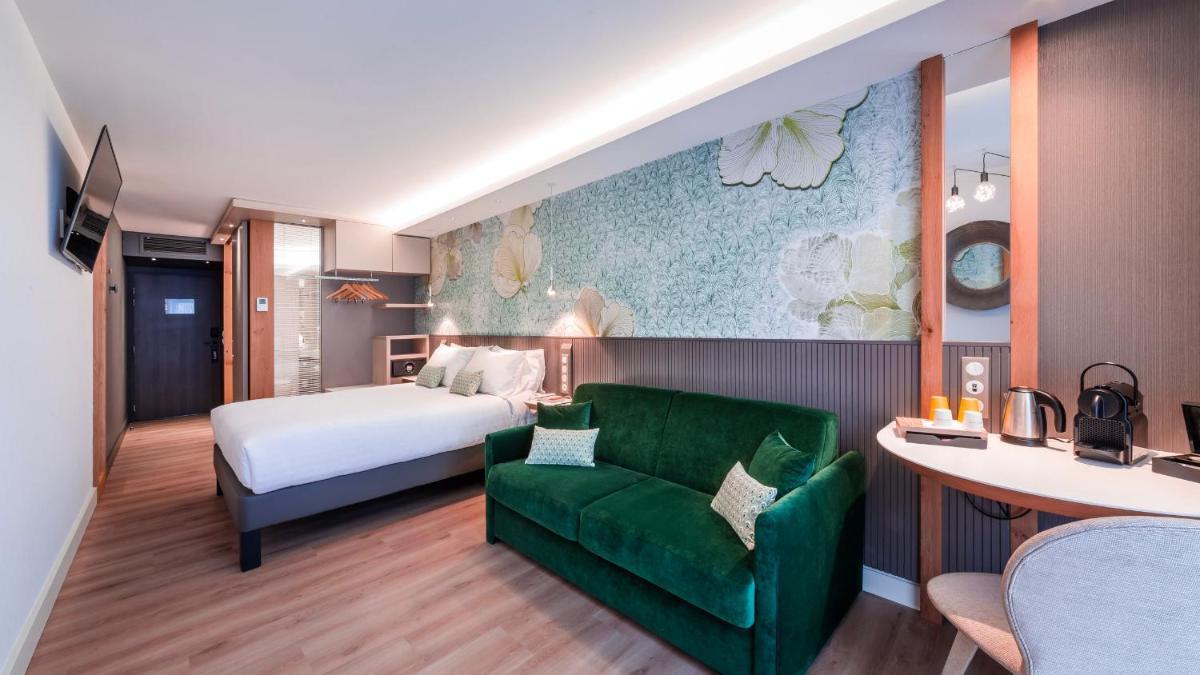 Un ou plusieurs lits dans un hébergement de l'établissement voco Strasbourg Centre - The Garden by IHG