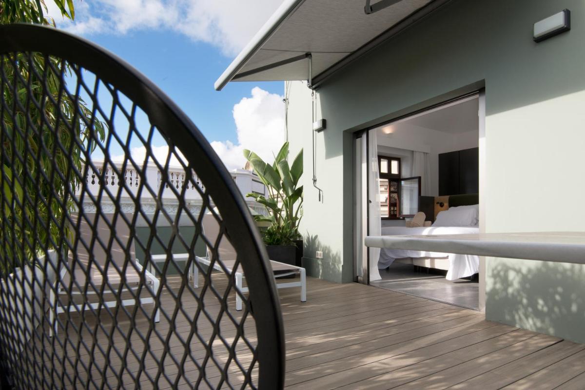 Un balcón o terraza de Suites 1478