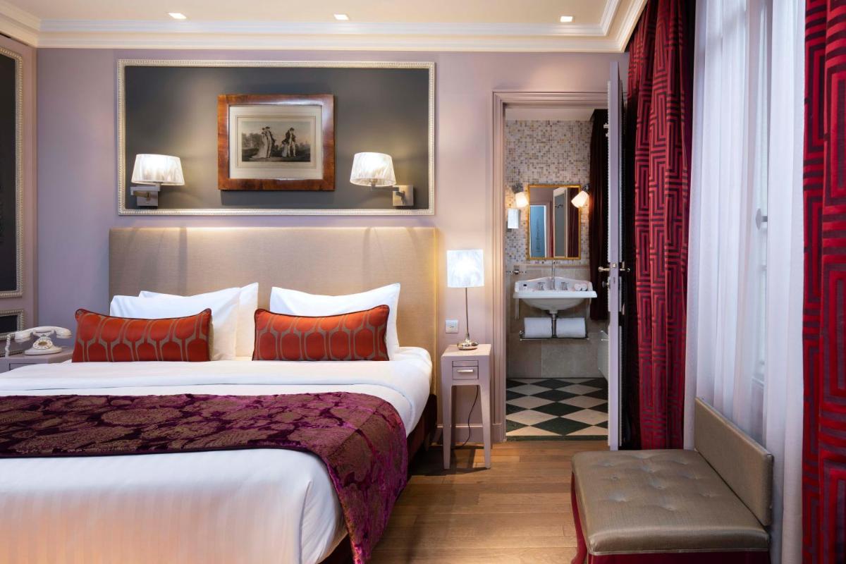 Un ou plusieurs lits dans un hébergement de l'établissement Hotel & Spa La Belle Juliette