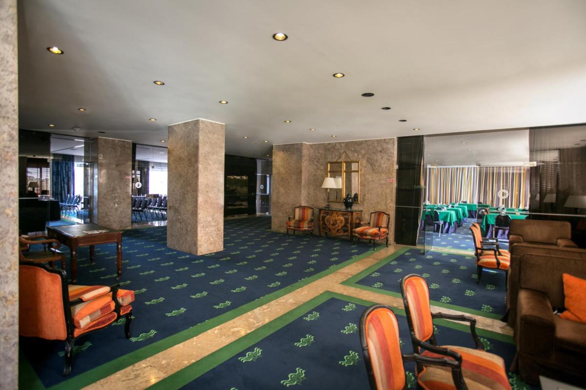 Uma área de estar em Hotel Solverde Spa and Wellness Center