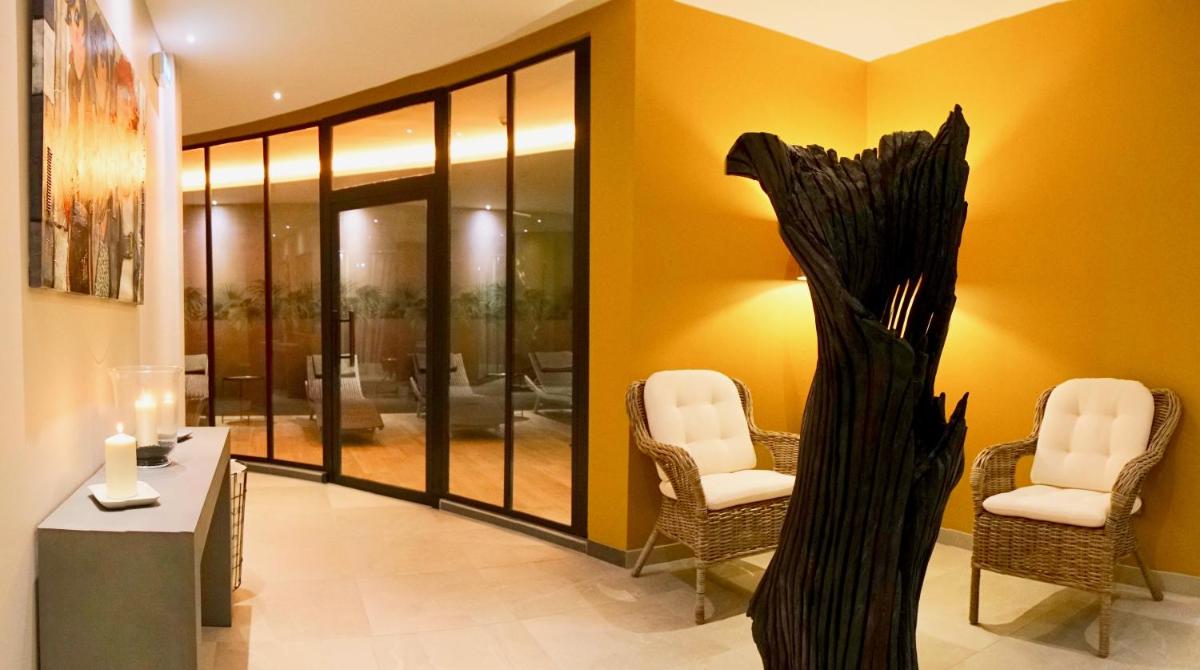 Coin salon dans l'établissement Au Soleil, Hôtel Restaurant & Spa