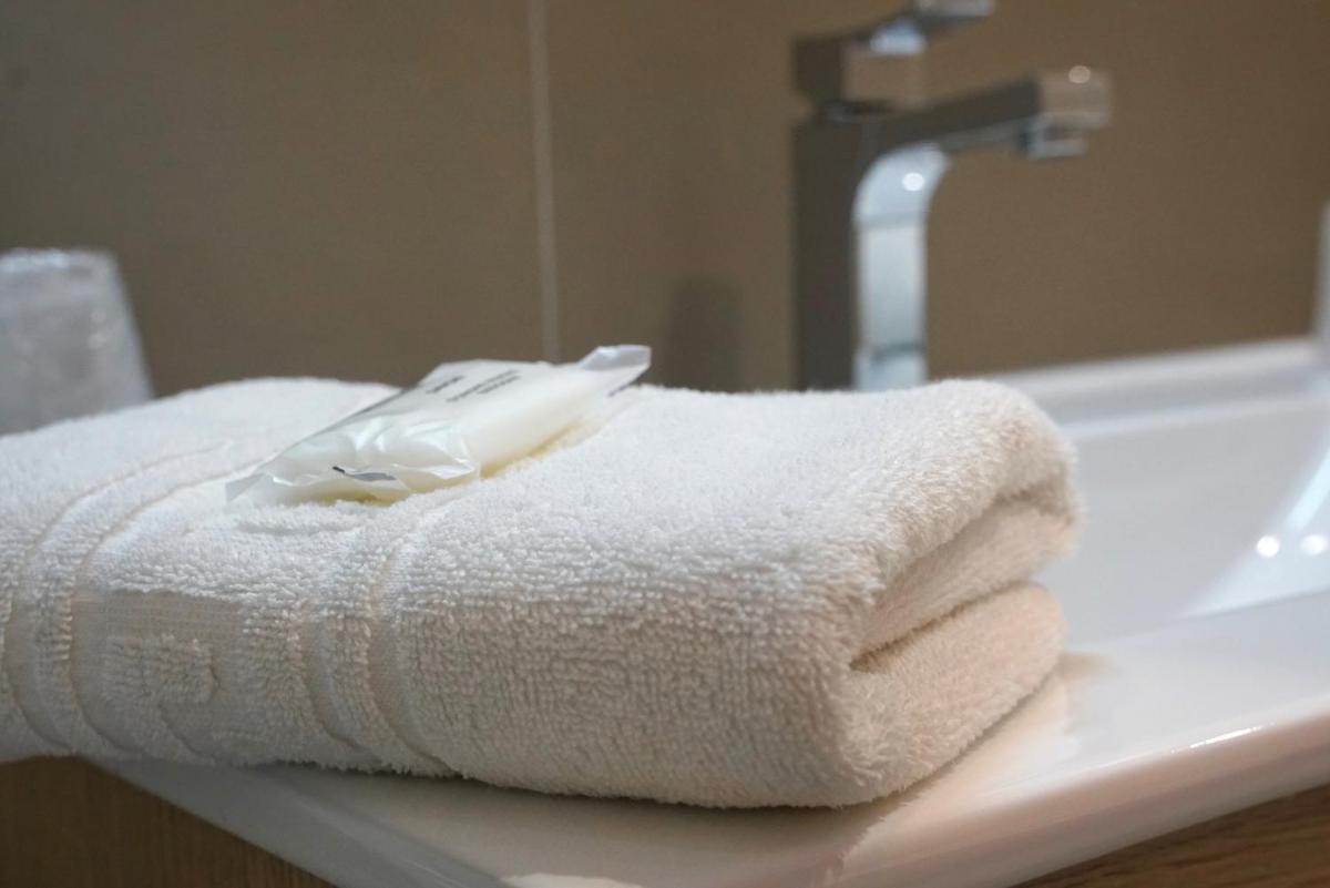 Salle de bains dans l'établissement Au Soleil, Hôtel Restaurant & Spa