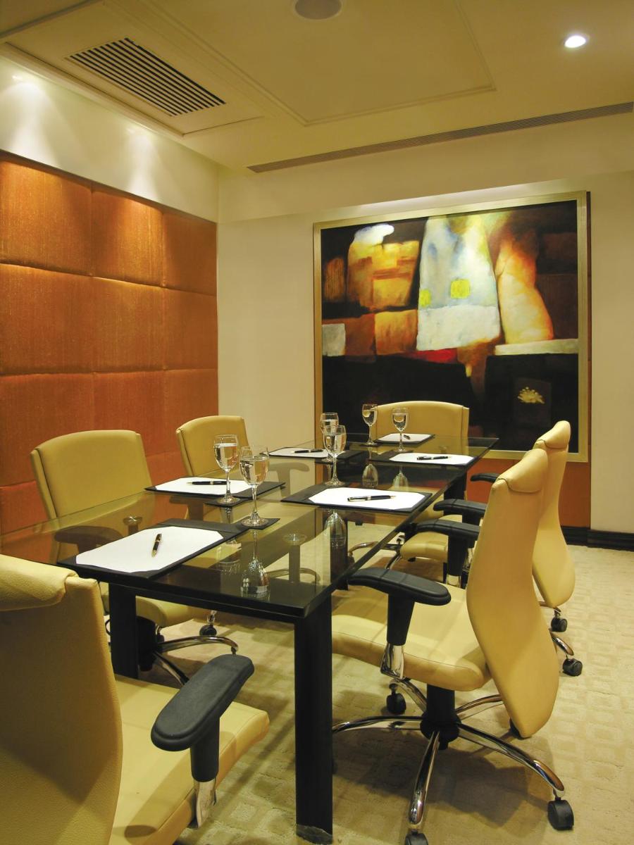 a conference room with a table and chairs at Taj Chandigarh in Chandīgarh