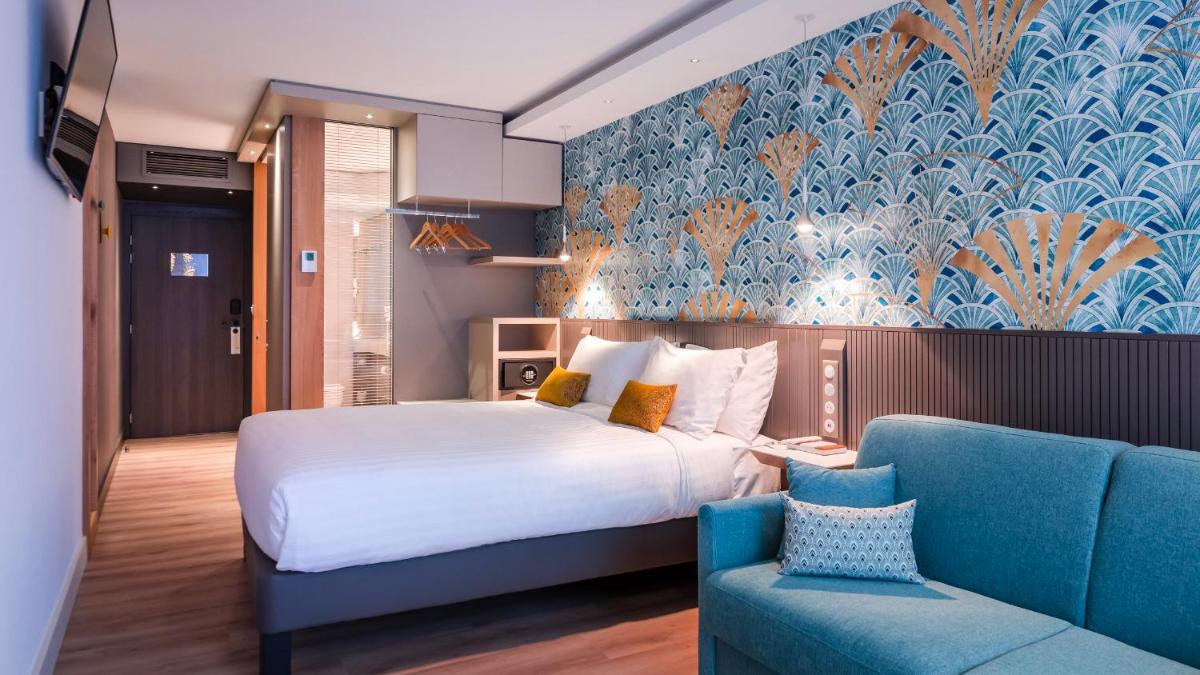 Un ou plusieurs lits dans un hébergement de l'établissement voco Strasbourg Centre - The Garden by IHG
