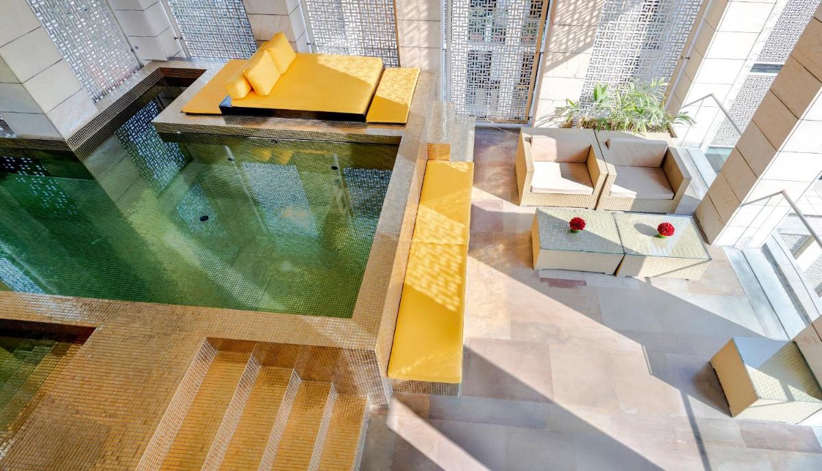 an overhead view of a pool in a building at The Lodhi – A member of The Leading Hotels Of The World in New Delhi
