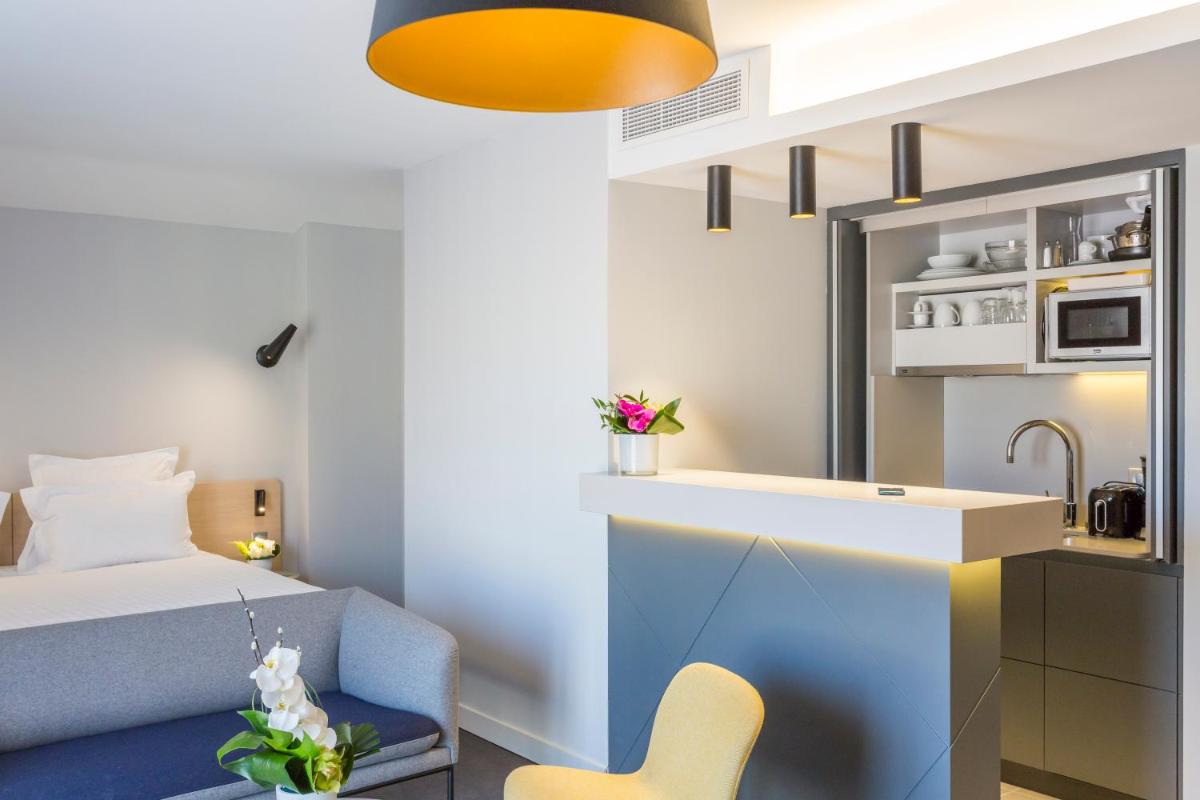 Cuisine ou kitchenette dans l'établissement Nemea Appart Hotel Cannes Palais