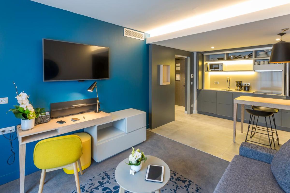 Cuisine ou kitchenette dans l'établissement Nemea Appart Hotel Cannes Palais