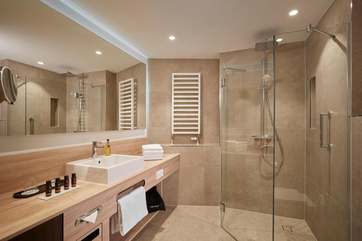 Ein Badezimmer in der Unterkunft HYPERION Hotel Berlin