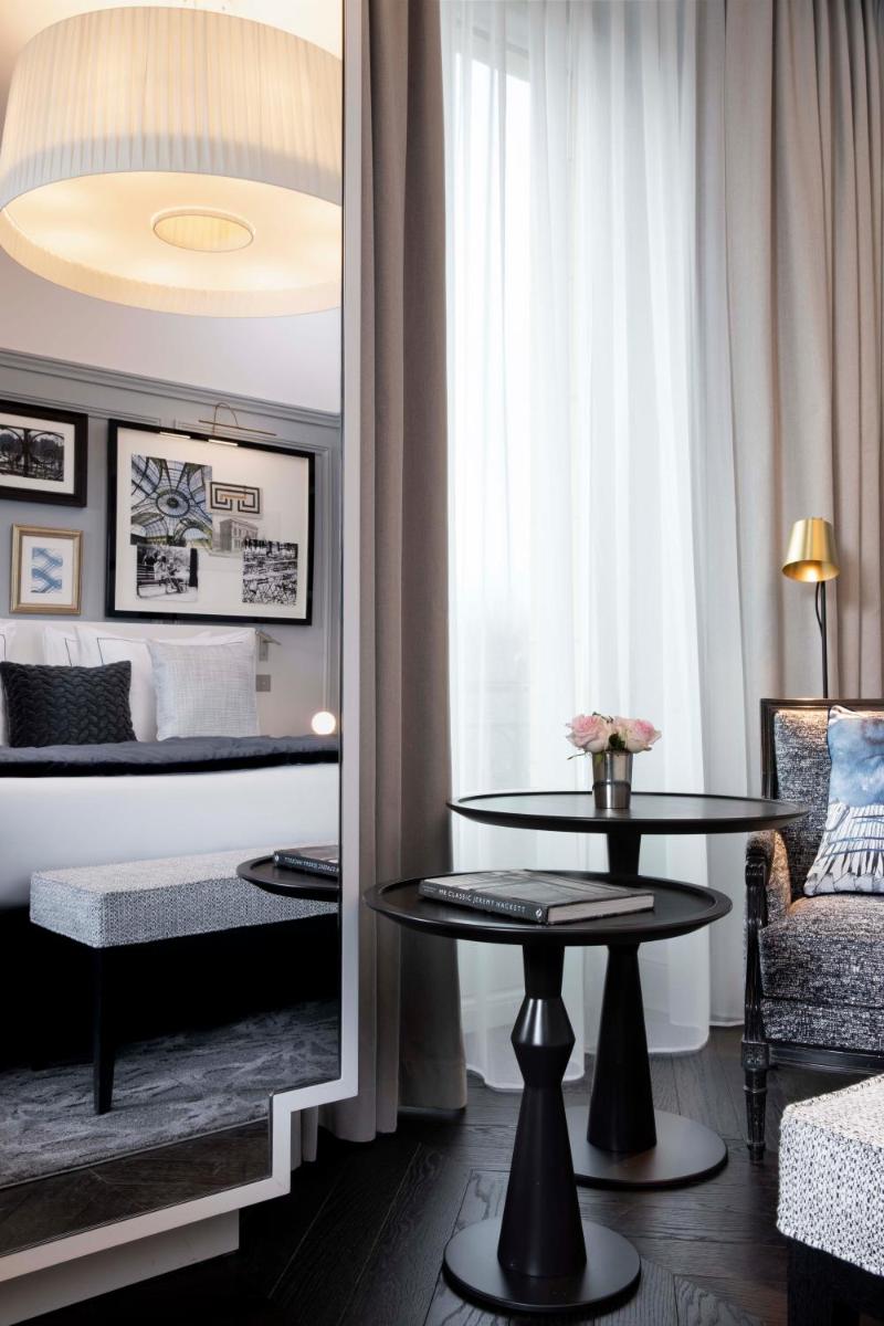 Un ou plusieurs lits dans un hébergement de l'établissement Le Damantin Hôtel & Spa