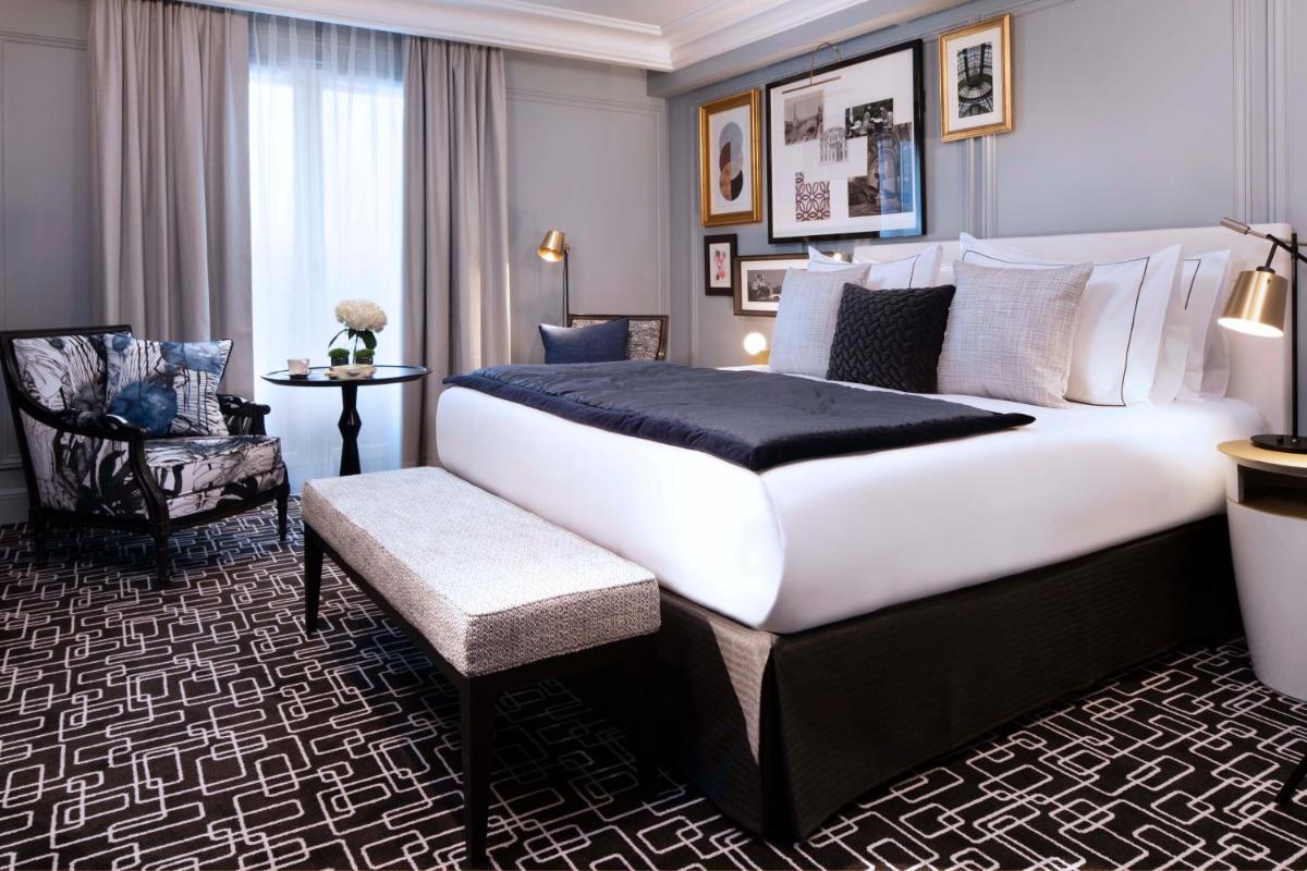 Un ou plusieurs lits dans un hébergement de l'établissement Le Damantin Hôtel & Spa