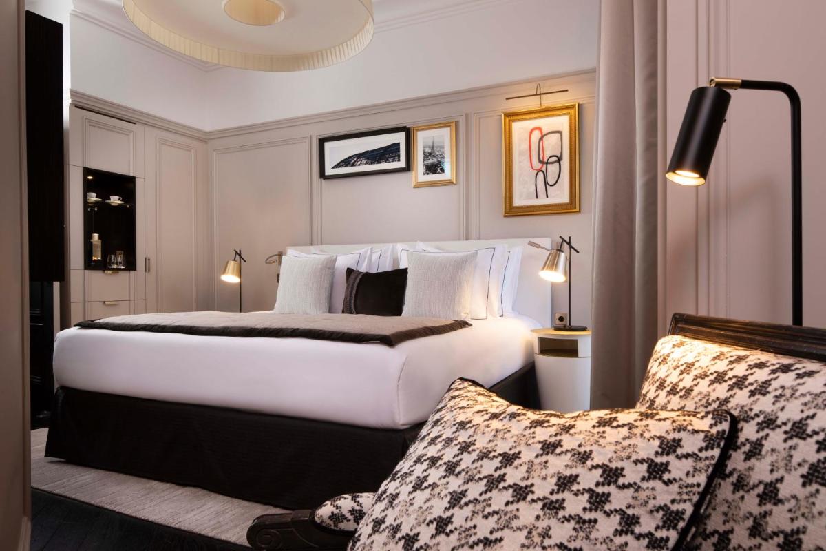 Un ou plusieurs lits dans un hébergement de l'établissement Le Damantin Hôtel & Spa
