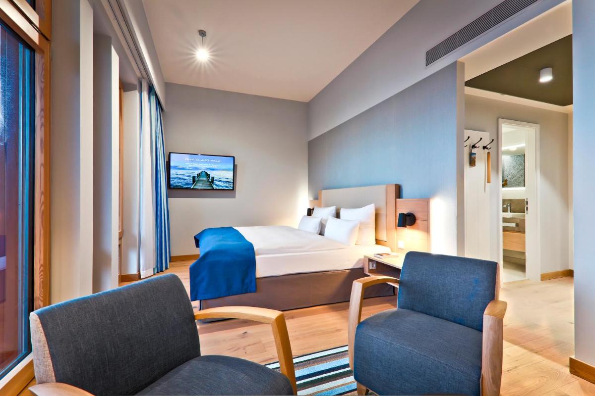 Ein Bett oder Betten in einem Zimmer der Unterkunft Upstalsboom Wyk auf Föhr