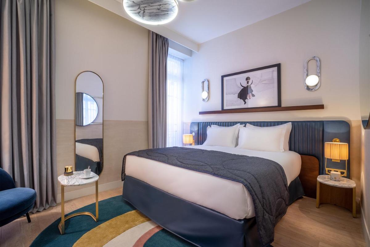 Un ou plusieurs lits dans un hébergement de l'établissement Maison Albar Hotels L’Imperator