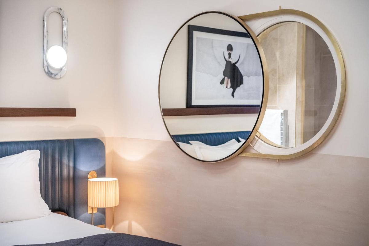 Un ou plusieurs lits dans un hébergement de l'établissement Maison Albar Hotels L’Imperator