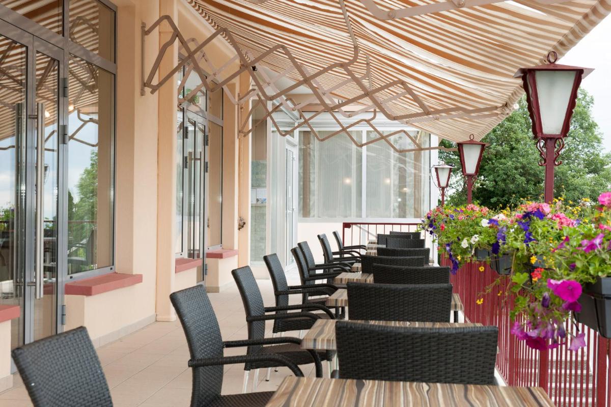 Coin salon dans l'établissement Alexain Hotel Restaurant & Wellness - Colmar Ouest