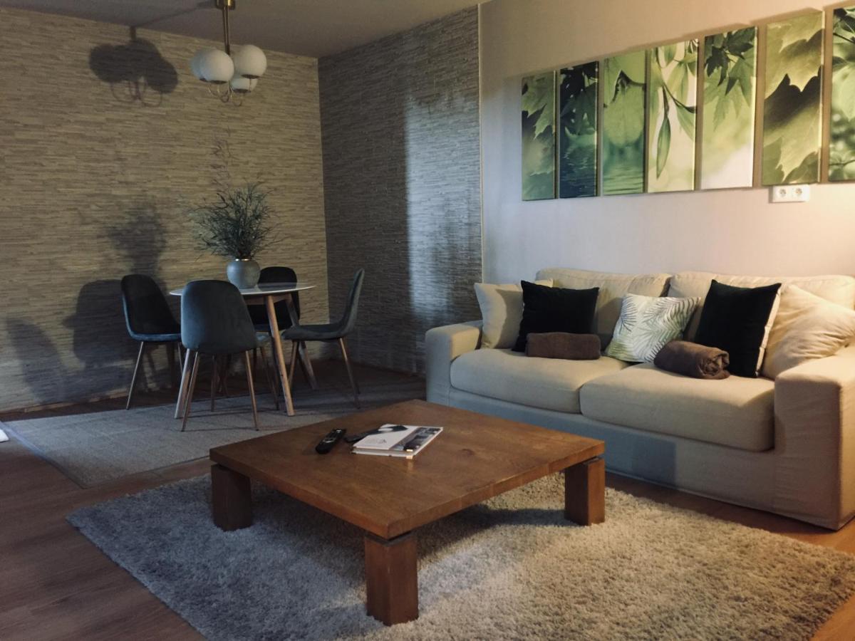 Coin salon dans l'établissement Domaine de Chalvêches Hôtel SPA 4*