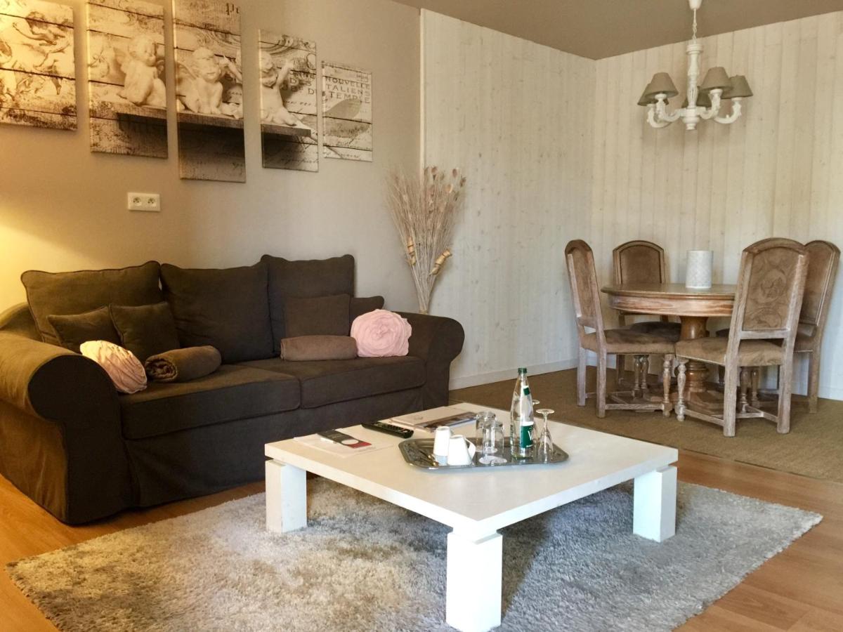 Coin salon dans l'établissement Domaine de Chalvêches Hôtel SPA 4*