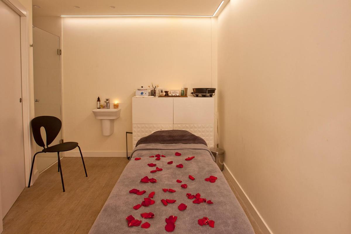 Cama o camas de una habitación en Hotel Pompaelo Plaza del Ayuntamiento & Spa