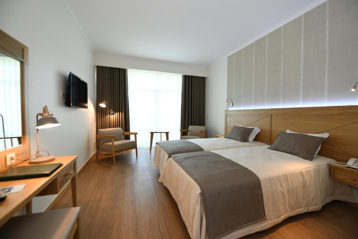 Uma cama ou camas num quarto em Hotel Do Campo