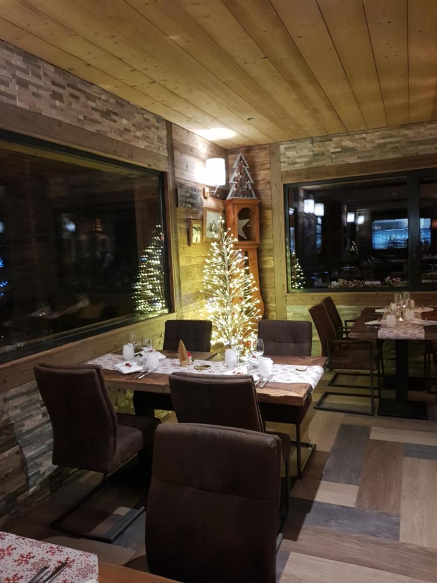Coin salon dans l'établissement Chalet Marano Restaurant & Spa