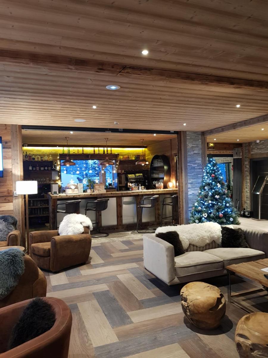 Coin salon dans l'établissement Chalet Marano Restaurant & Spa