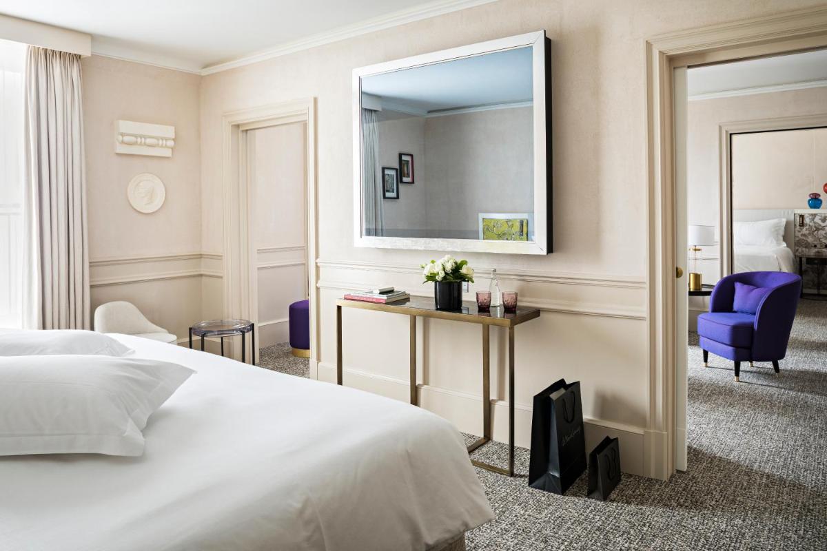 Un ou plusieurs lits dans un hébergement de l'établissement Sofitel Le Scribe Paris Opera