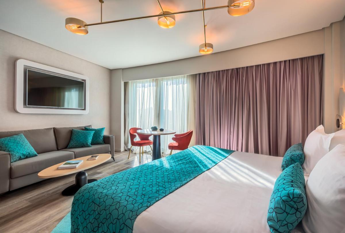 Cama o camas de una habitación en Barceló Sevilla Renacimiento