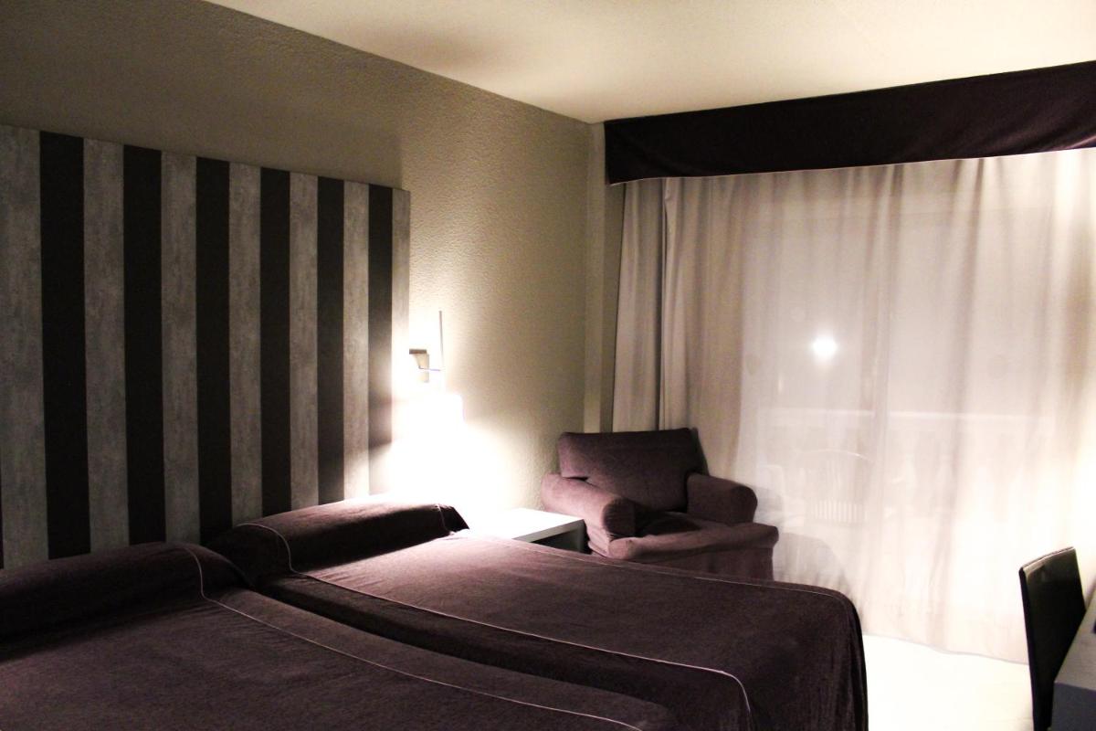 Cama o camas de una habitación en Hotel Bernat II 4*Sup
