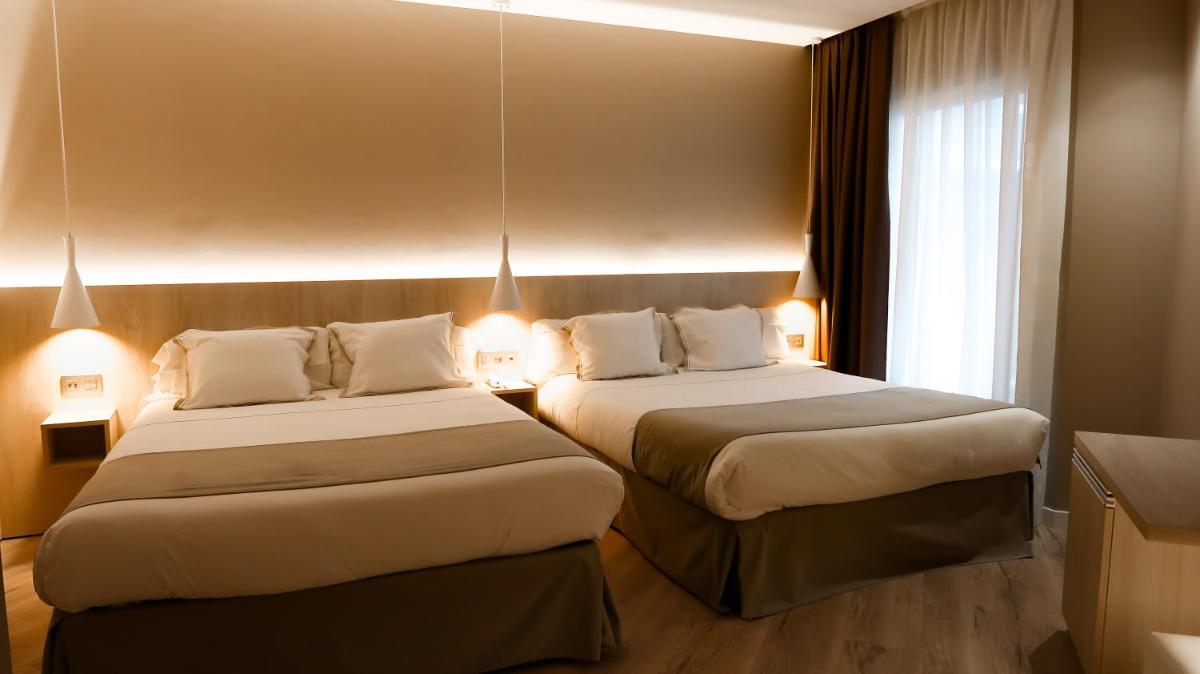 Cama o camas de una habitación en Hotel Bernat II 4*Sup
