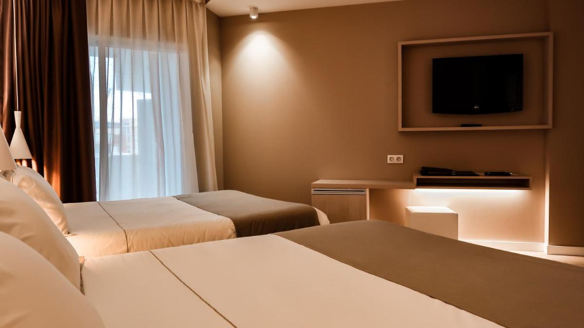 Cama o camas de una habitación en Hotel Bernat II 4*Sup