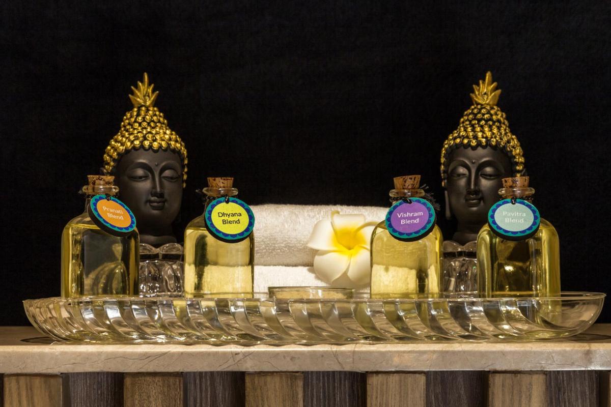 a group of three black heads sitting on a table at Lemon Tree Premier City Center Pune in Pune