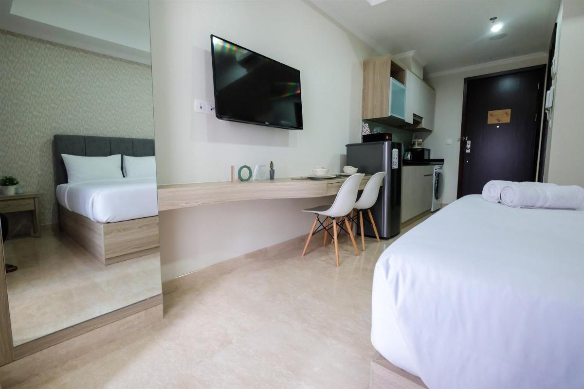 Minimalist Studio Menteng Park Apartment By Travelio - Housity