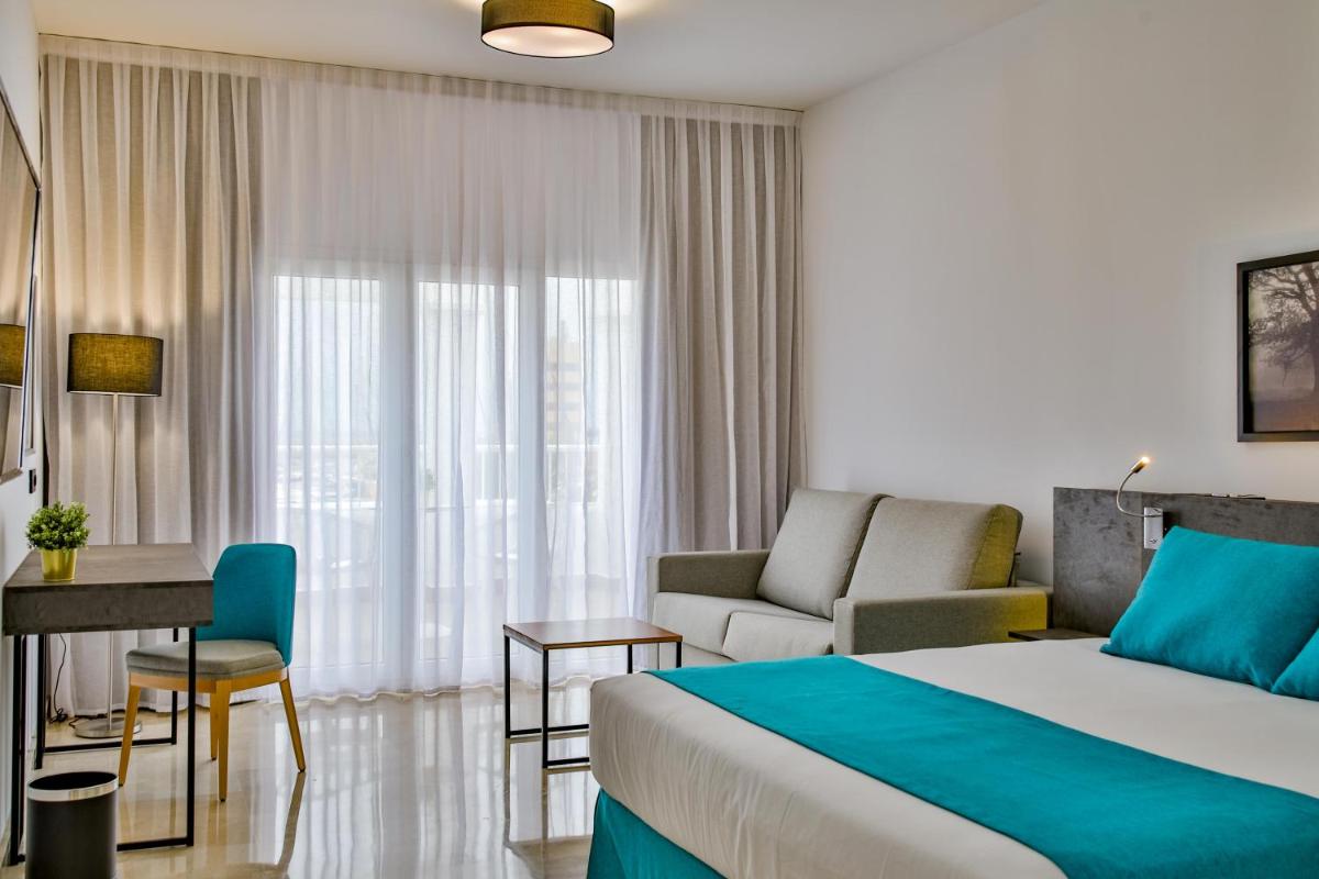 Cama o camas de una habitación en Moon Hotel & SPA.