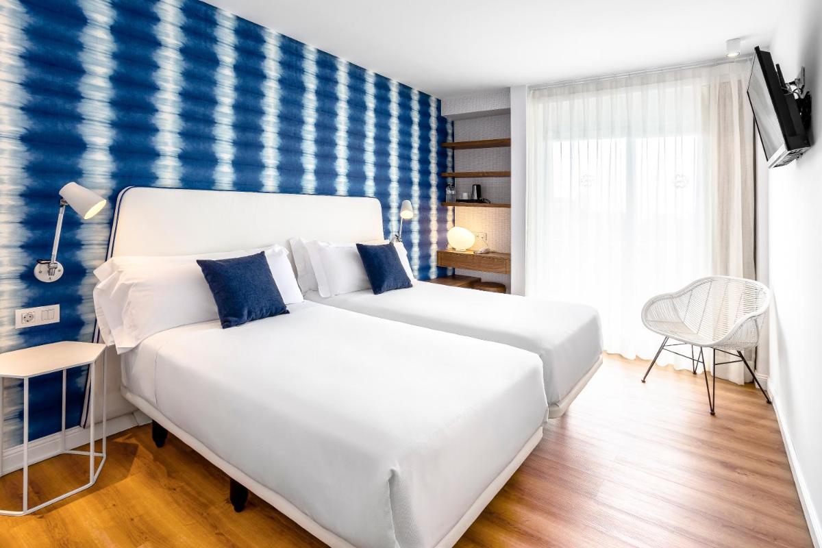 Cama o camas de una habitación en Hotel Anabel