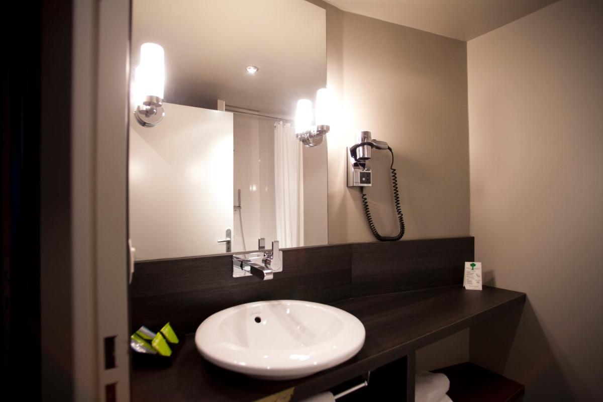 Salle de bains dans l'établissement B&B HOME Lyon Centre Berthelot