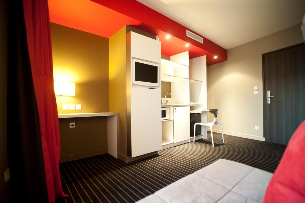 Cuisine ou kitchenette dans l'établissement B&B HOME Lyon Centre Berthelot