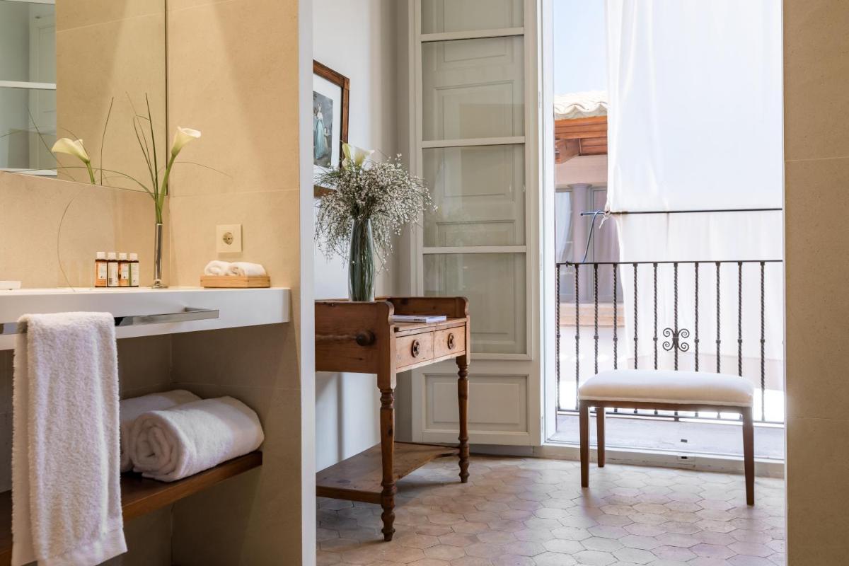 Cama o camas de una habitación en Hotel Can Cera