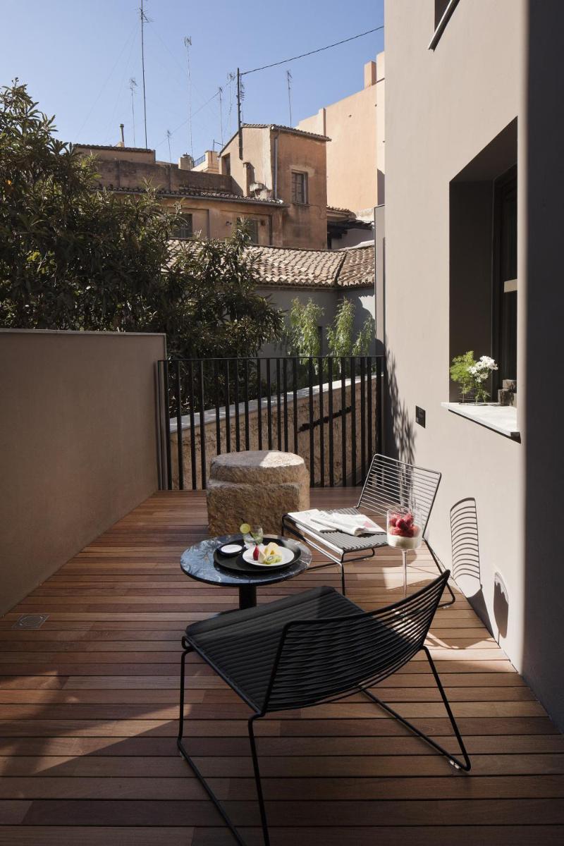 Un balcón o terraza de Caro Hotel