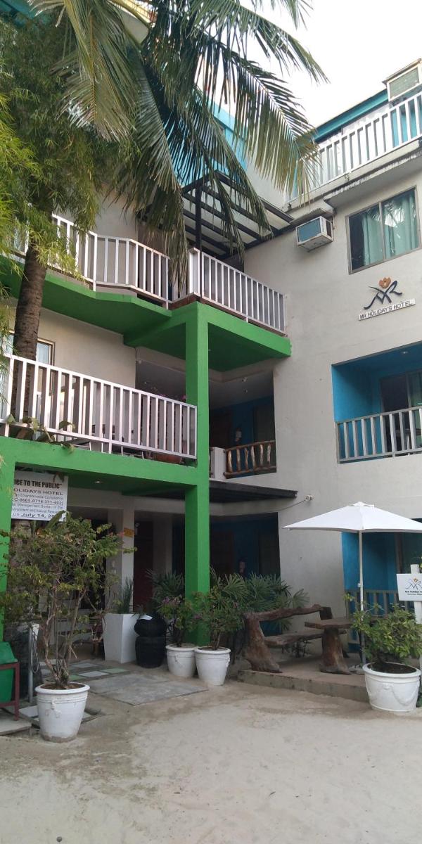 MR Holidays Hotel - Housity