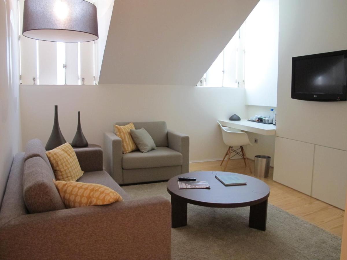 Uma televisão e/ou sistema de entretenimento em Inspira Liberdade Boutique Hotel