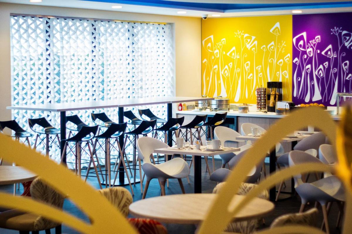 Restaurant ou autre lieu de restauration dans l'établissement Kyriad Prestige Amiens Poulainville - Hotel and Spa