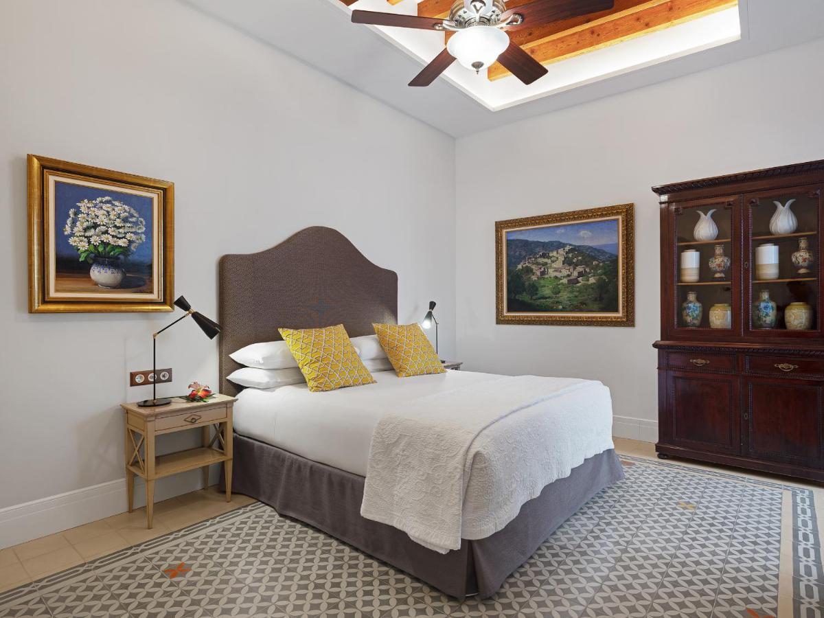 Cama o camas de una habitación en Hotel Gloria de Sant Jaume