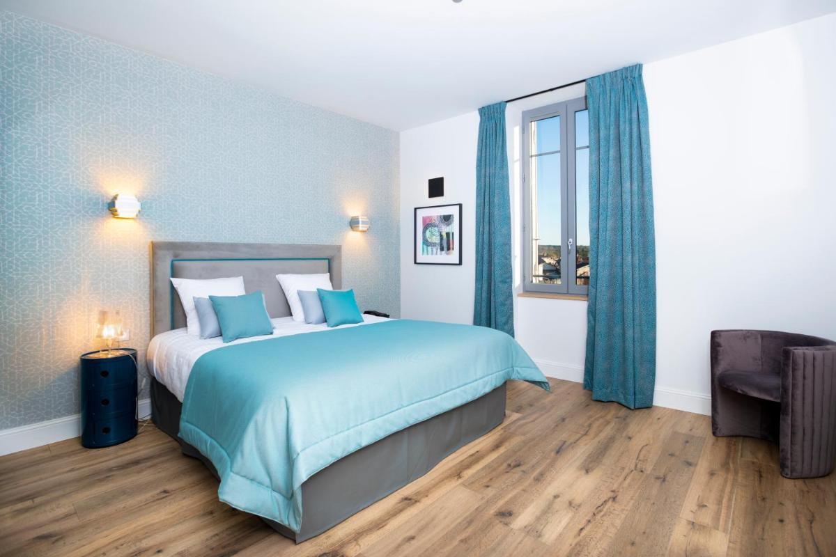 Un ou plusieurs lits dans un hébergement de l'établissement Hotel Clos Castel Villas Spa