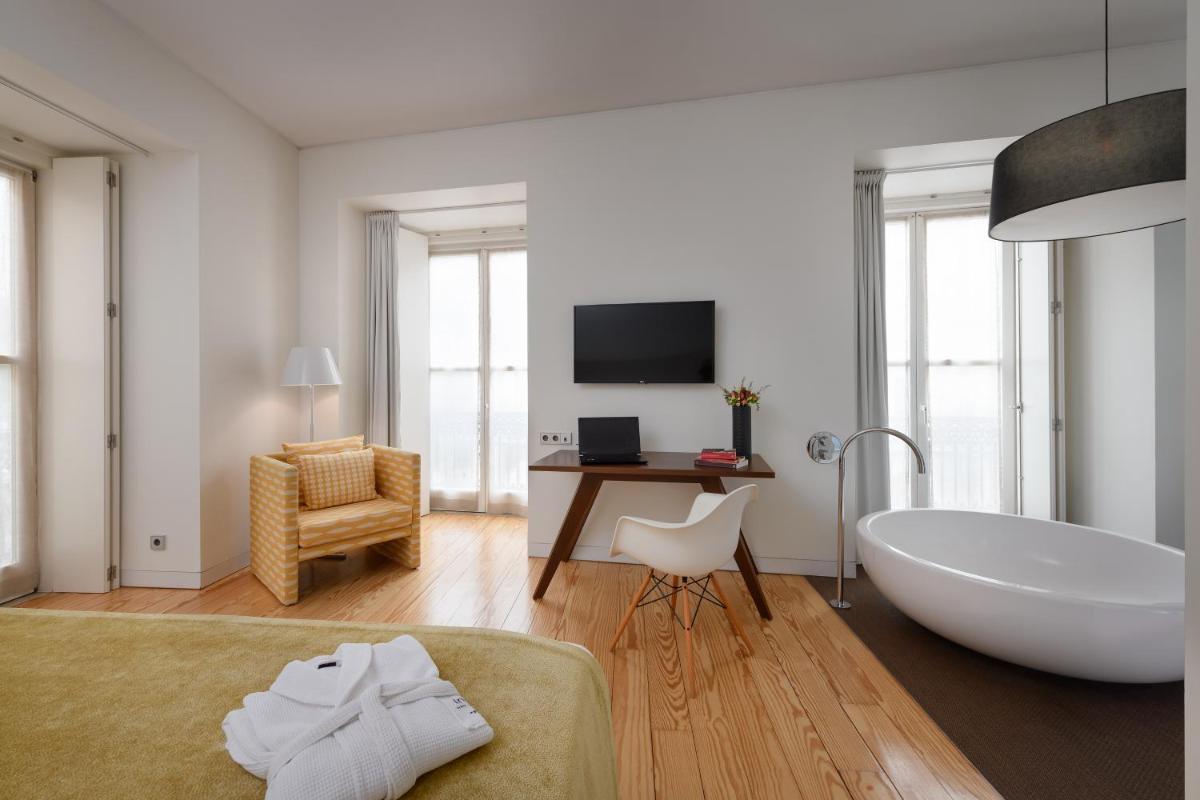 Uma televisão e/ou sistema de entretenimento em Inspira Liberdade Boutique Hotel