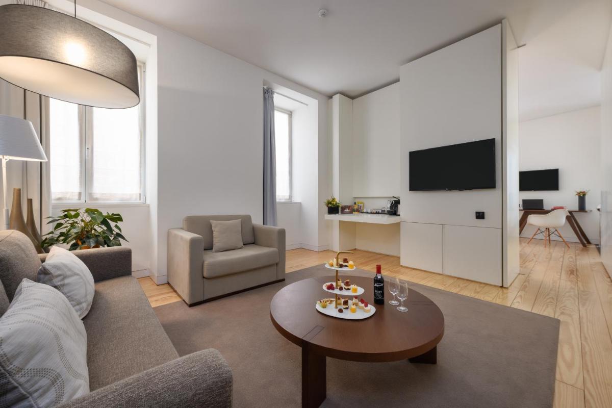 Uma televisão e/ou sistema de entretenimento em Inspira Liberdade Boutique Hotel