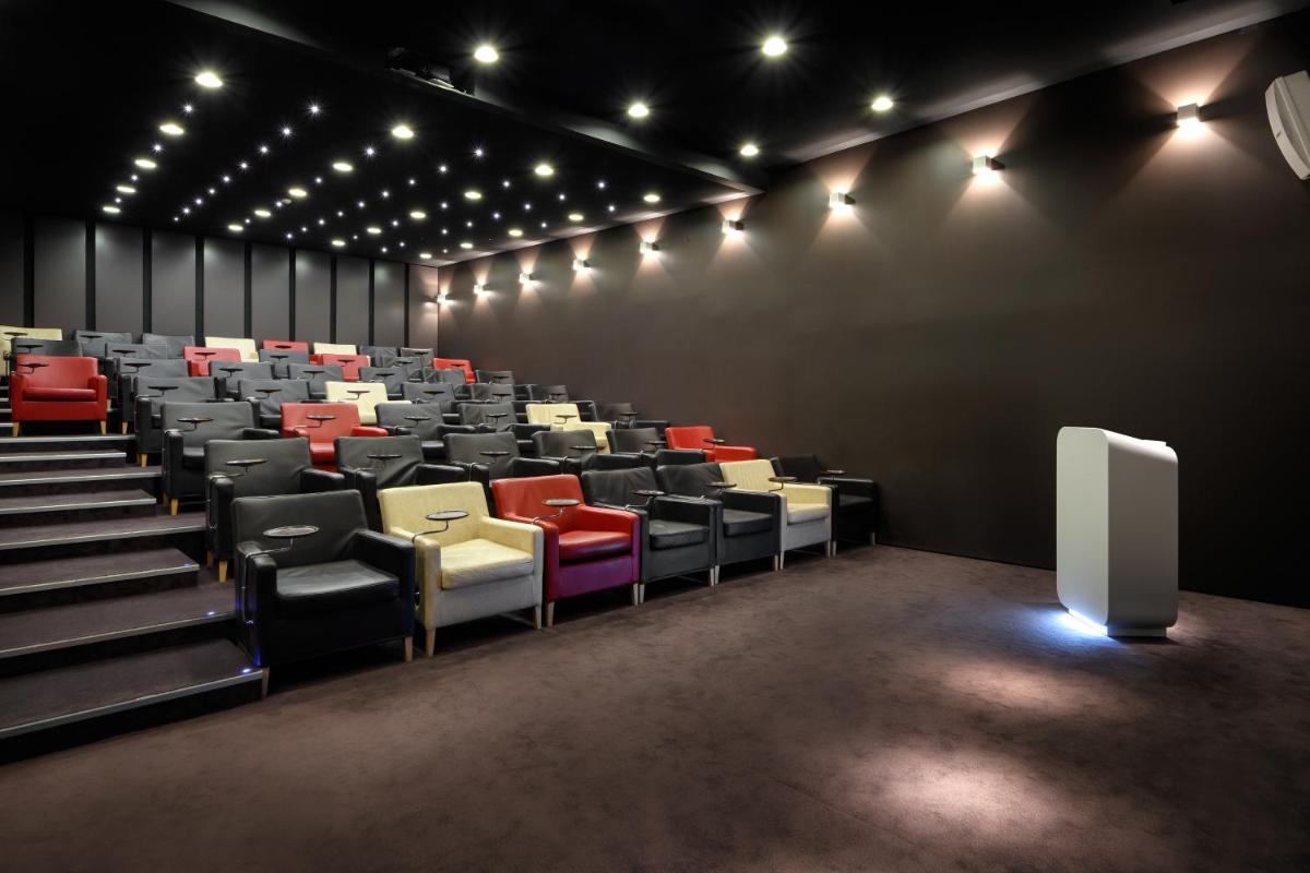 Uma área de estar em Inspira Liberdade Boutique Hotel