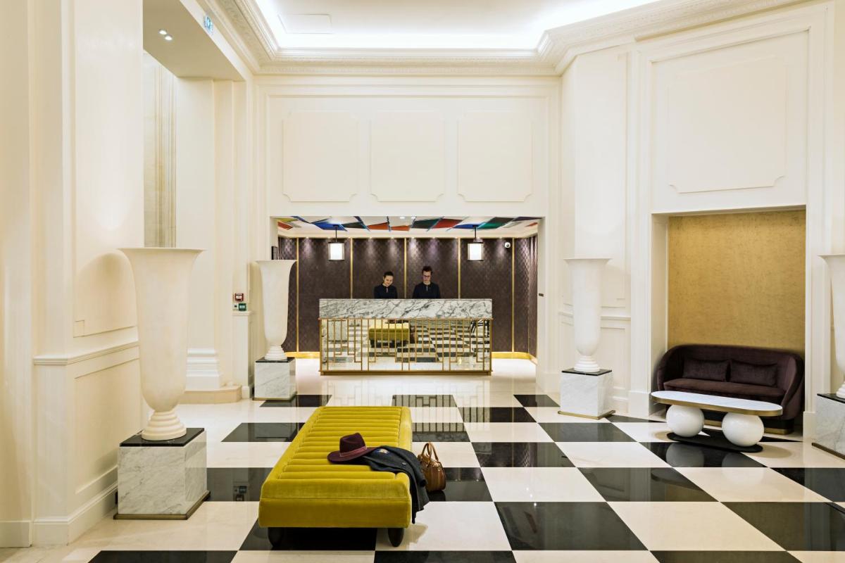 Coin salon dans l'établissement Sofitel Le Scribe Paris Opera