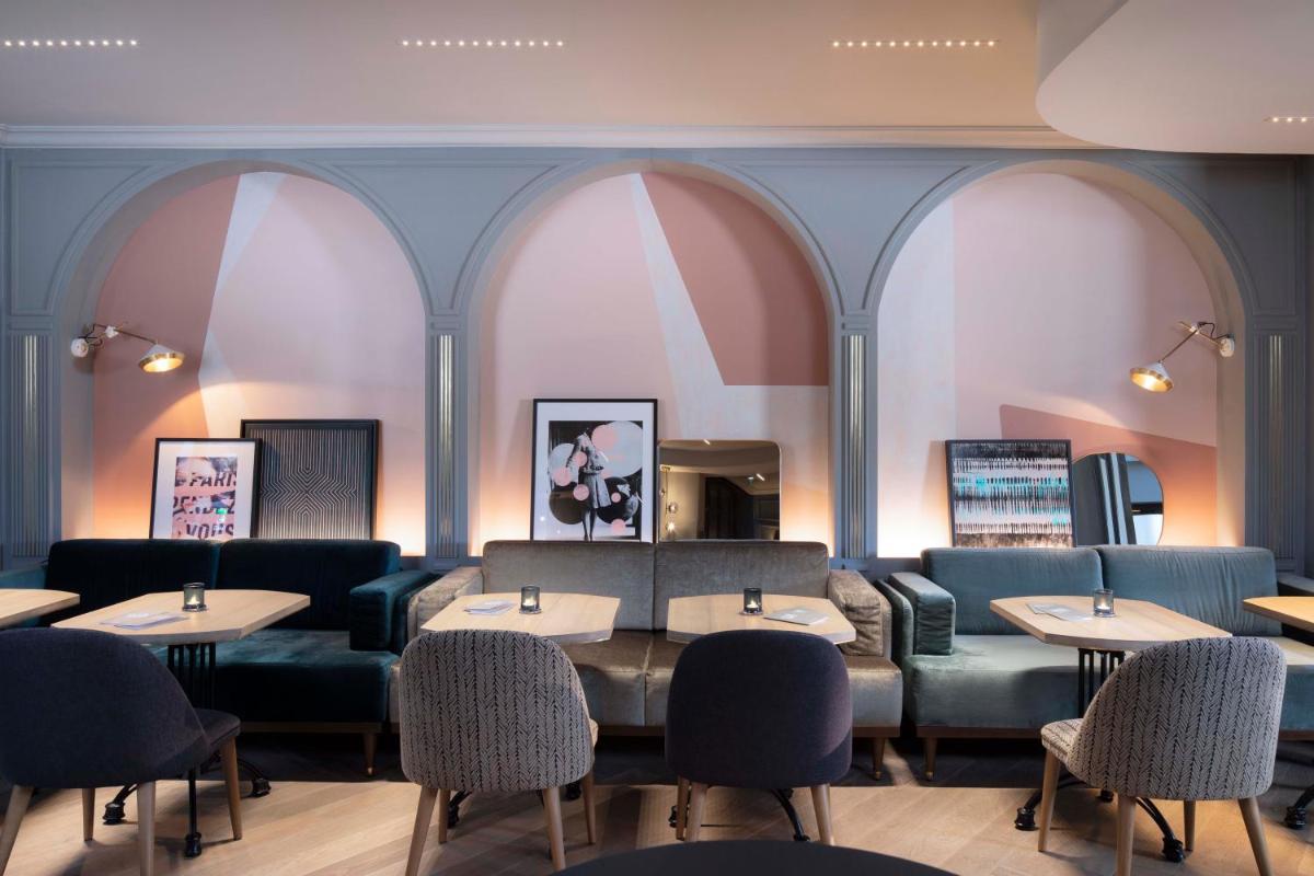 Coin salon dans l'établissement Maison ELLE Paris