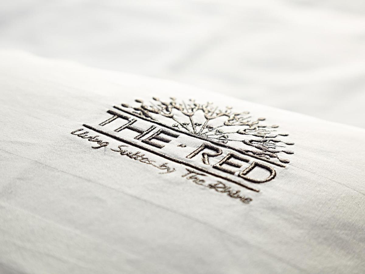 Ein Zertifikat, Auszeichnung, Logo oder anderes Dokument, das in der Unterkunft The Red Apartments ausgestellt ist